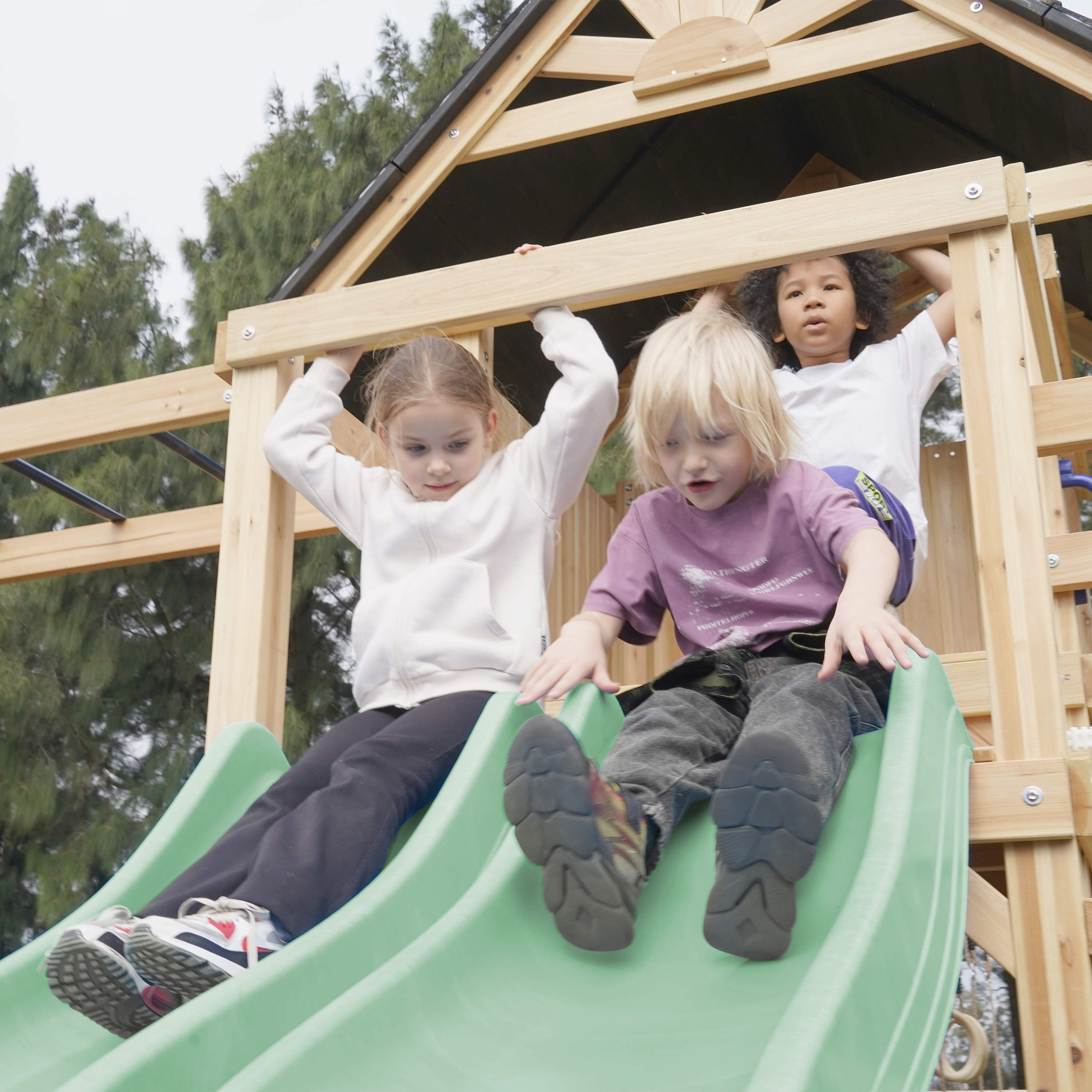 AXI Hunter Climbing Frame with Swings, Climbing Frame, Climbing Bridge and Multiple Platforms – Pastel Green Double Slide