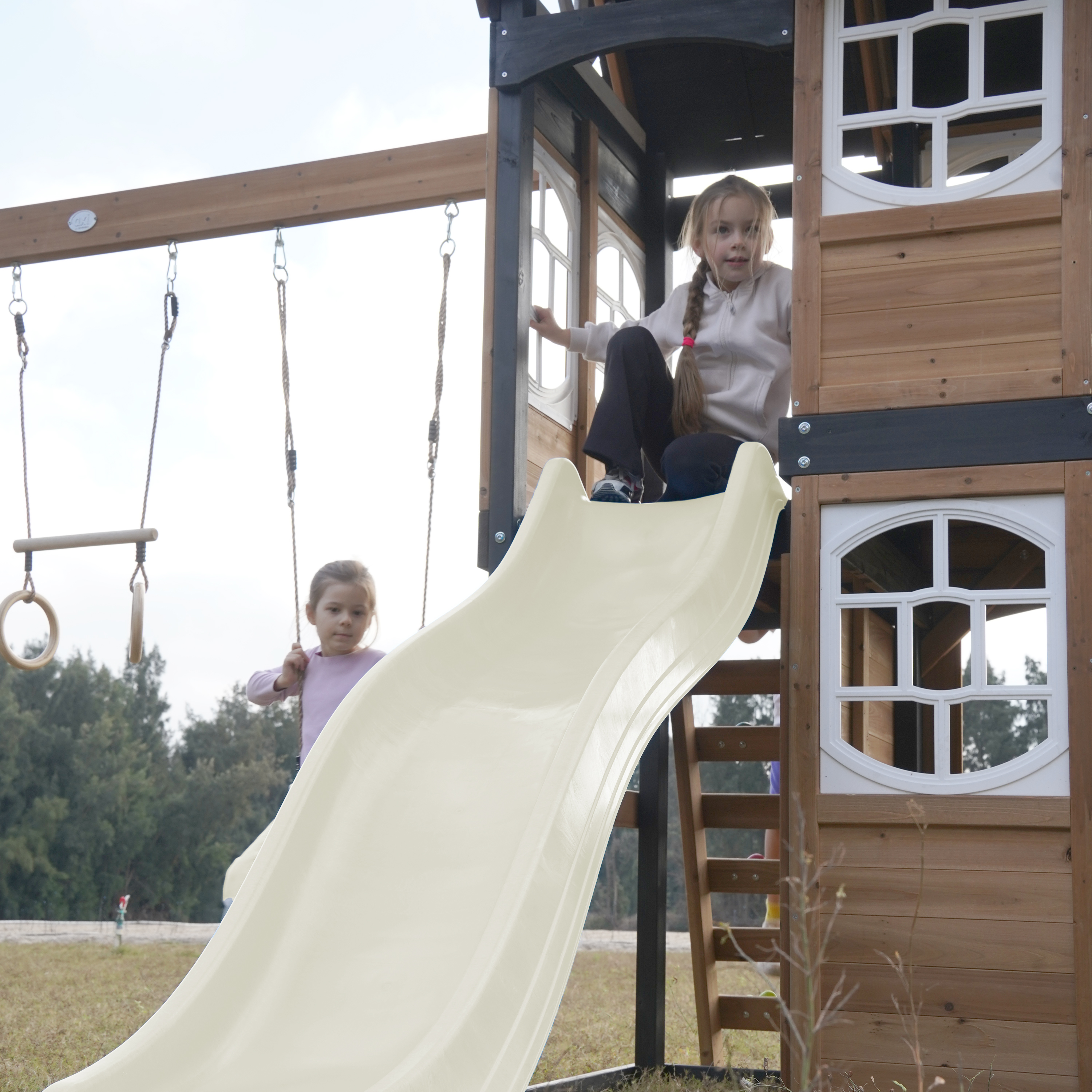 AXI Noud Climbing Frame with Playhouse, Swings, Trapeze and Climbing Wall – Cream Slide and Tube Slide